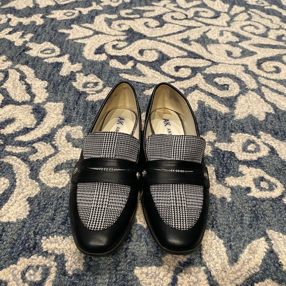 Anne Klein Shoes - Anne Klein iflex loafers with lion button detailing and gingham tongue.